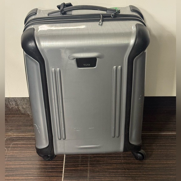Tumi Silver and Black Hardside Spinner Carry-On
